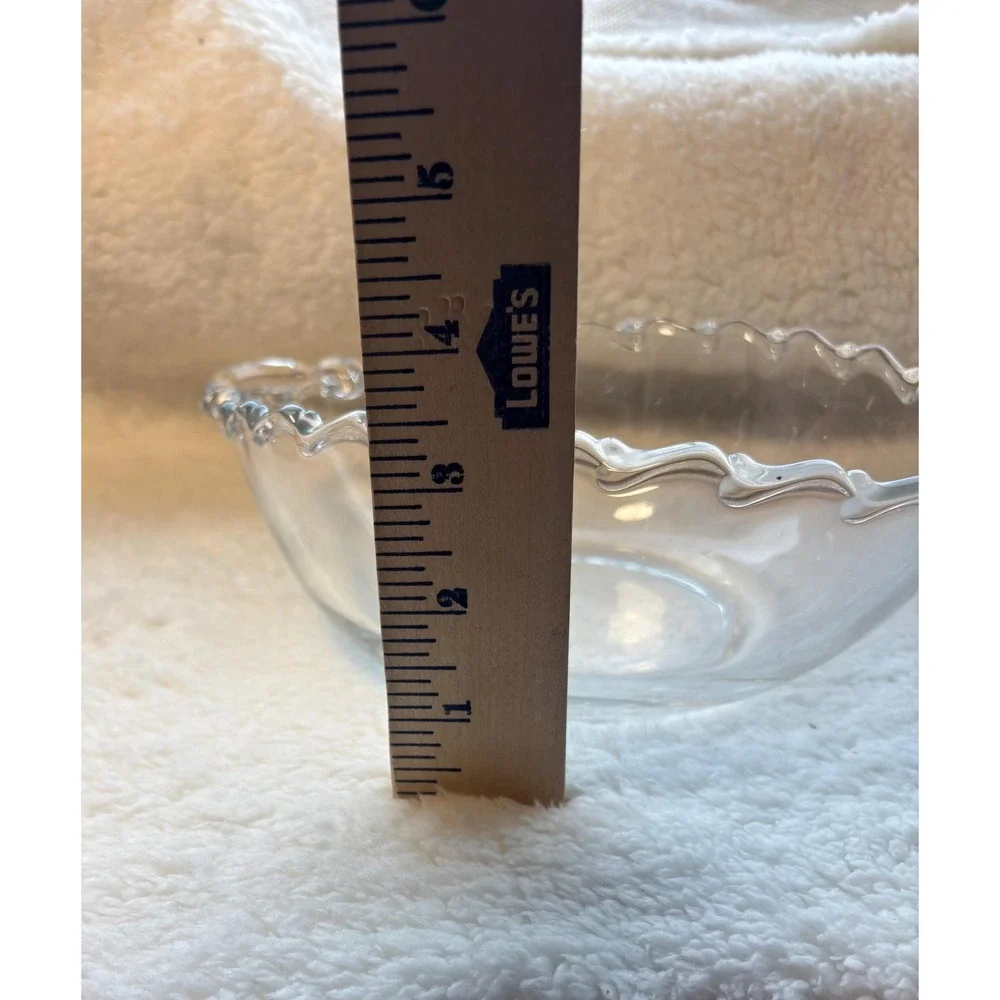 vintage clear glass item is a handled bowl from the Century pattern, mfct by